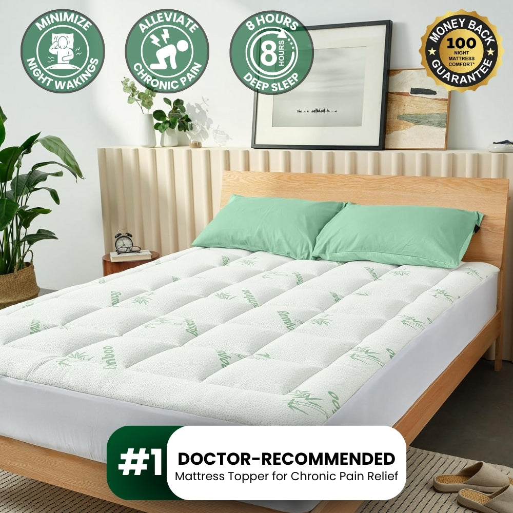 SootheSleep Relief Topper in White on a queen bed